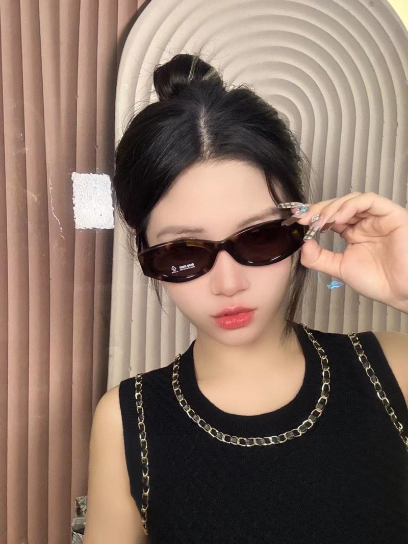 Miu miu Sunglasses